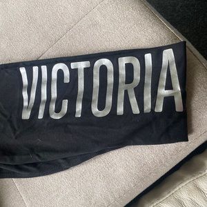 Victoria’s Secret black leggings size medium with silver detail on leg
